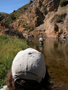 The back of the hat says: Exceeding Expectations