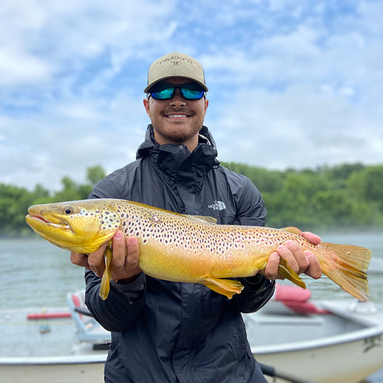 Judd's first fish on the White River Huge Thanks to @whiteriverflyanglers_  for putting us together!