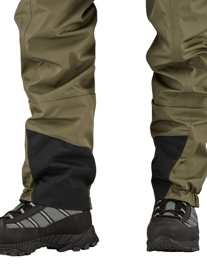 Patagonia Men's Swiftcurrent Traverse Zip-Front Waders is built for years of work and engineered to reduce weight and bulk without sacrificing durability and available at Mad River Outfitters!