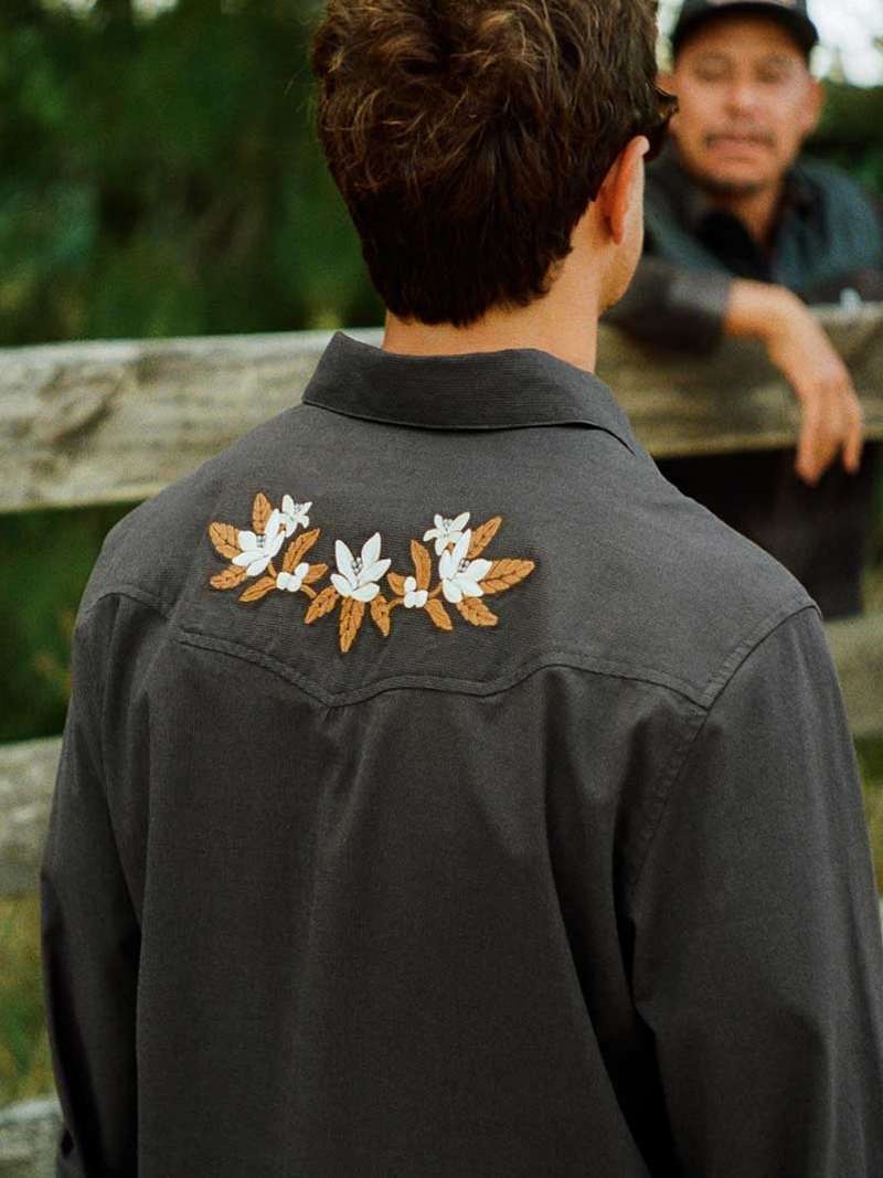 Howler Brothers Crosscut Deluxe Snapshirt- Orange Blossoms on Antique Black